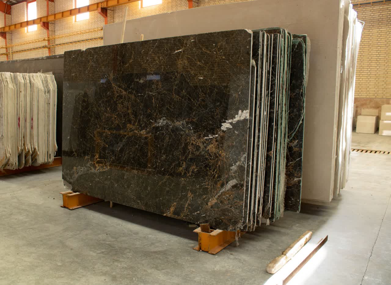 Iranian Golden Black Marble predominantly features a deep black background