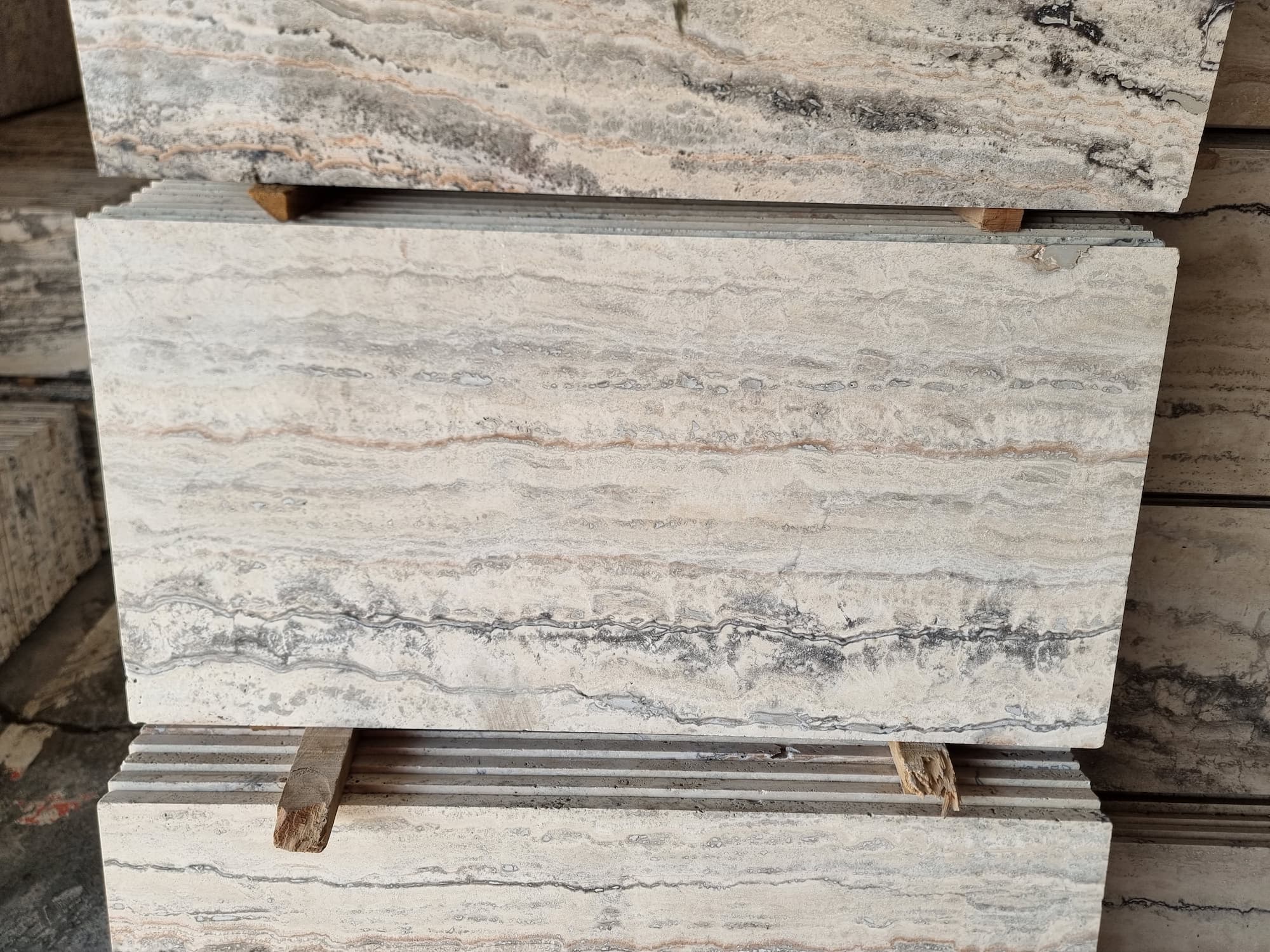 - The different colors and patterns of silver travertine